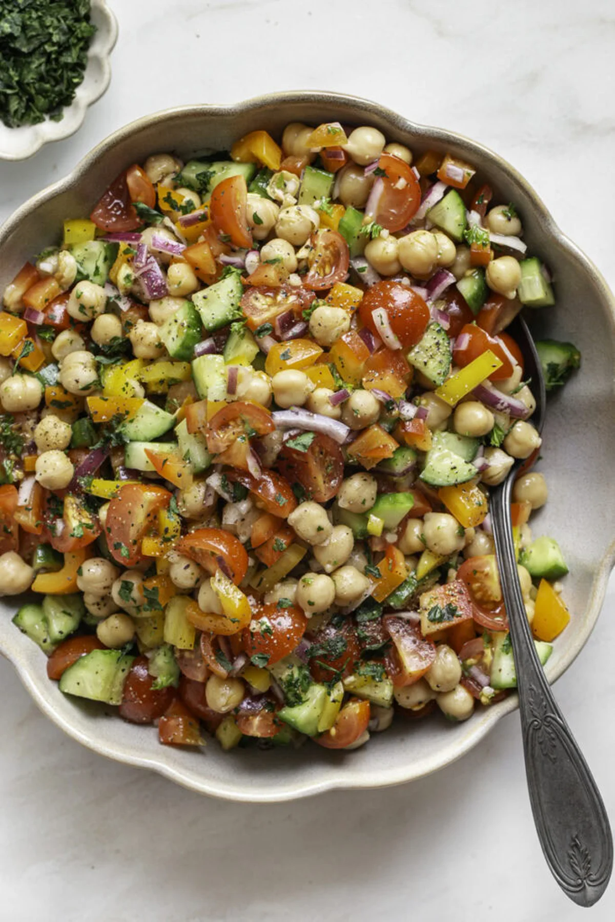 Chopped bell peppers and vegetables ready for the bowl