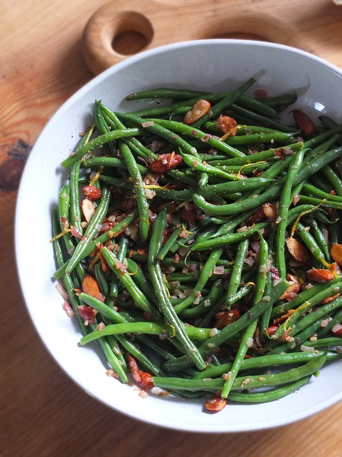 Finished green beans almondine with toasted almonds