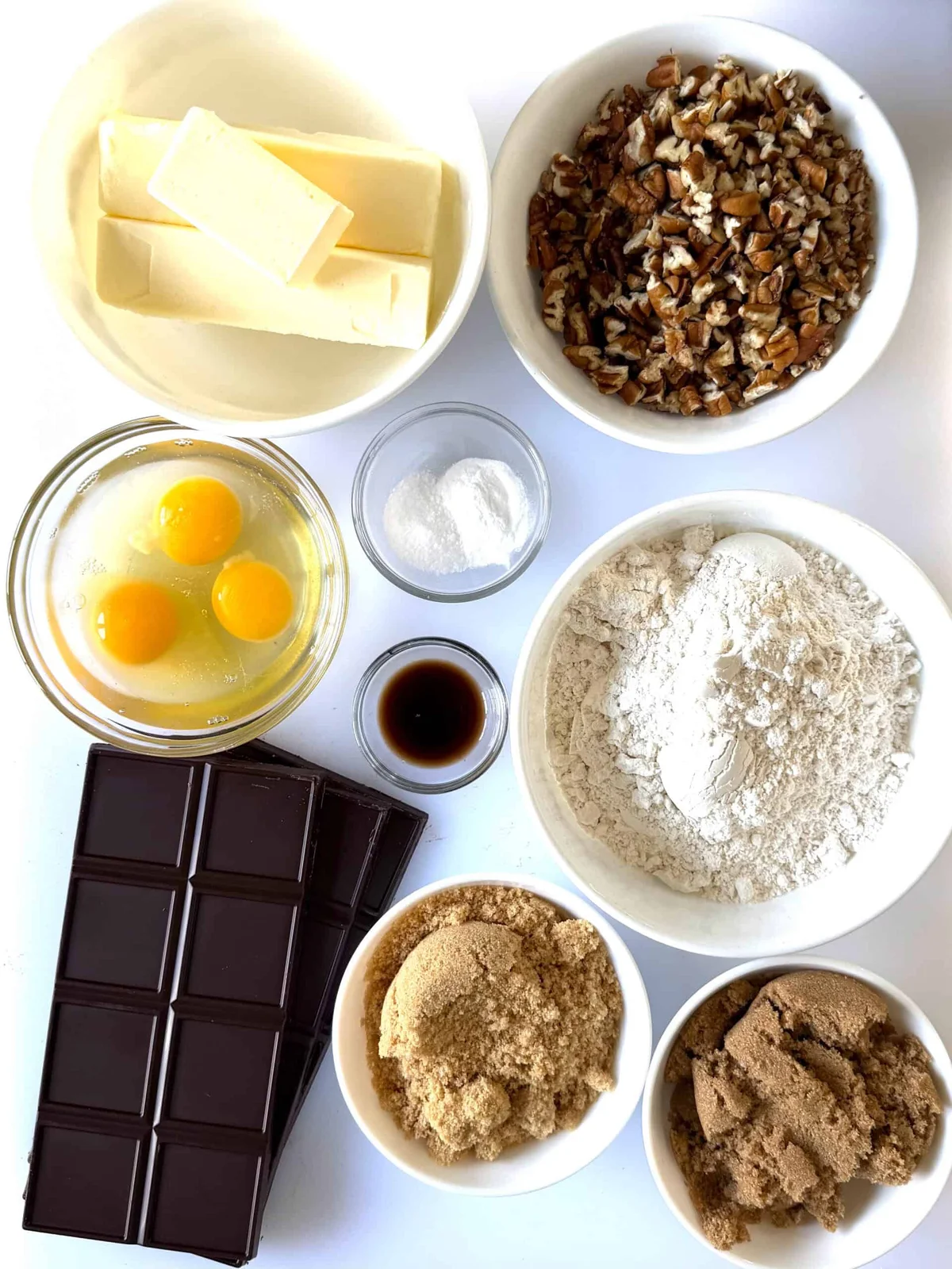 Chocolate chunks, pecans, and butter ready for cookie dough