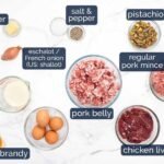 Labeled terrine ingredients arranged on a white marble counter