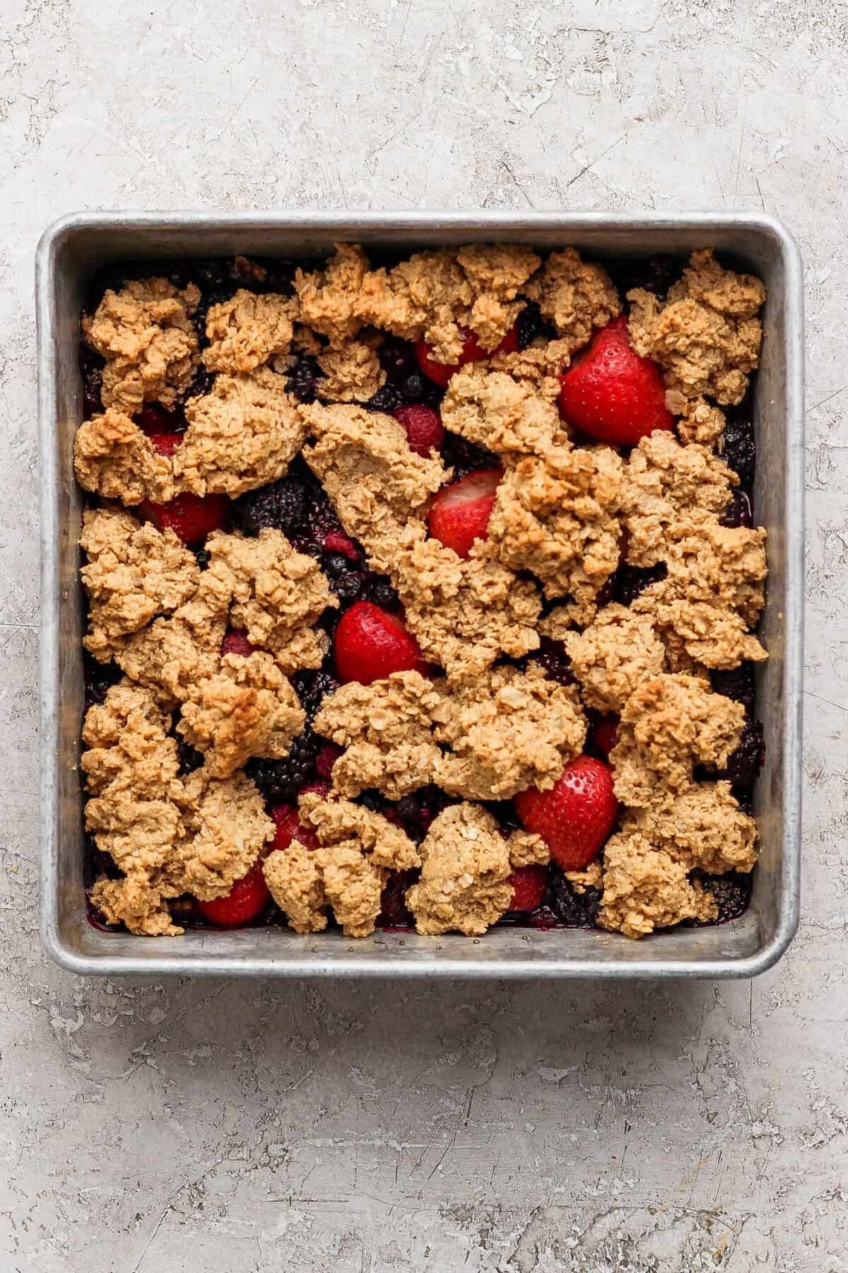 Golden peanut butter-oat crumble baked over jammy berries
