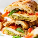Caprese sandwich with fresh basil, tomato, and mozzarella