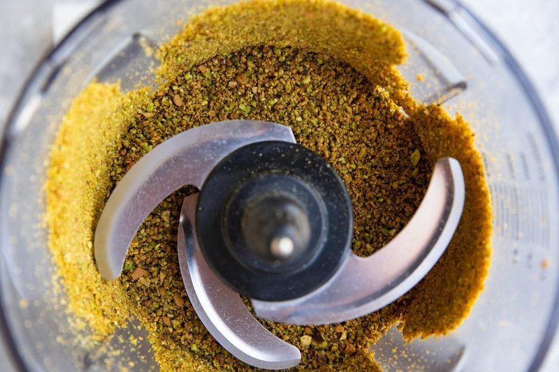 Coarse ground pistachio flour in a food processor