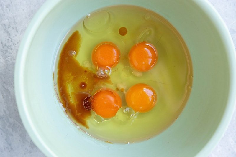 Cracked eggs in a bowl for the cake batter