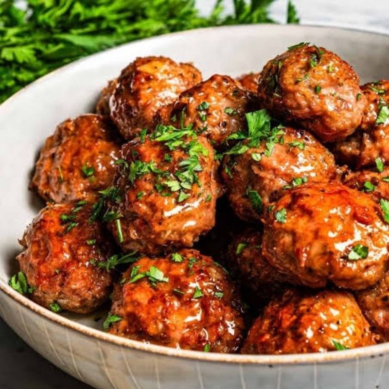 Mini turkey meatballs with glossy maple glaze on a plate