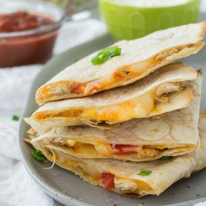 Golden cheese quesadilla triangles filled with turkey and cheddar