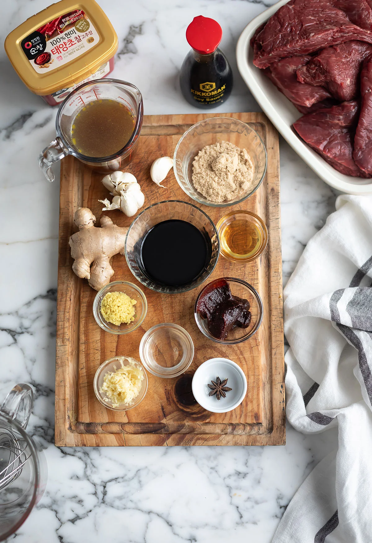 Gochujang, ginger, garlic and soy sauce ingredients for the marinade